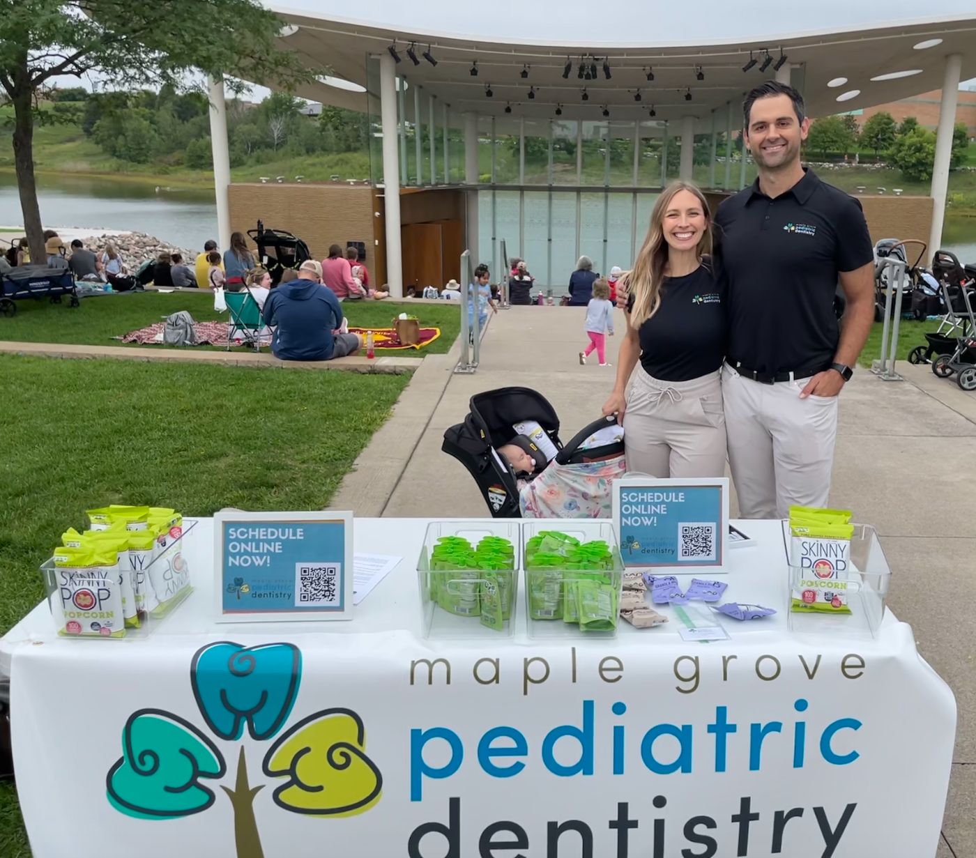 Dr. Matt and team at a Maple Grove community event, greeting families at the practice's booth